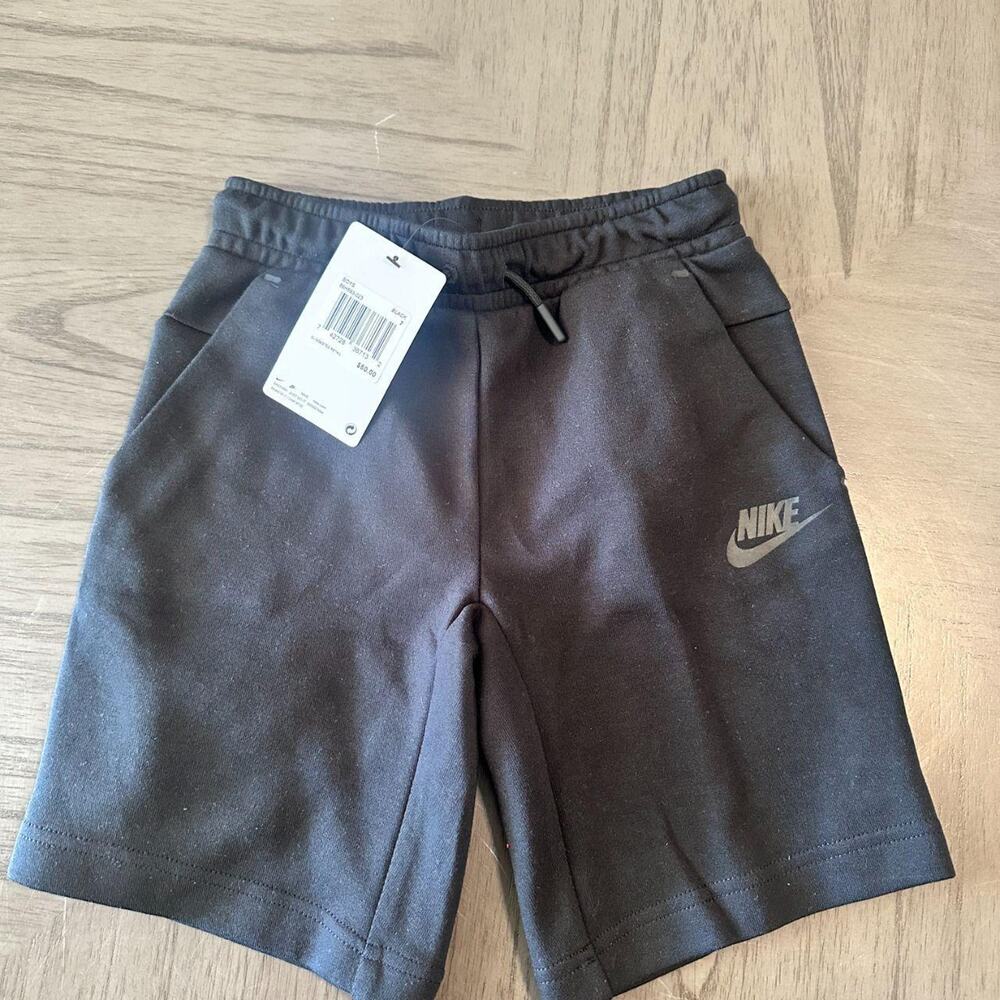 Nike tech shorts size 7
